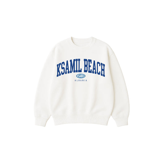 White sweatshirt with 'Ksamil Beach Albania' text on a white background