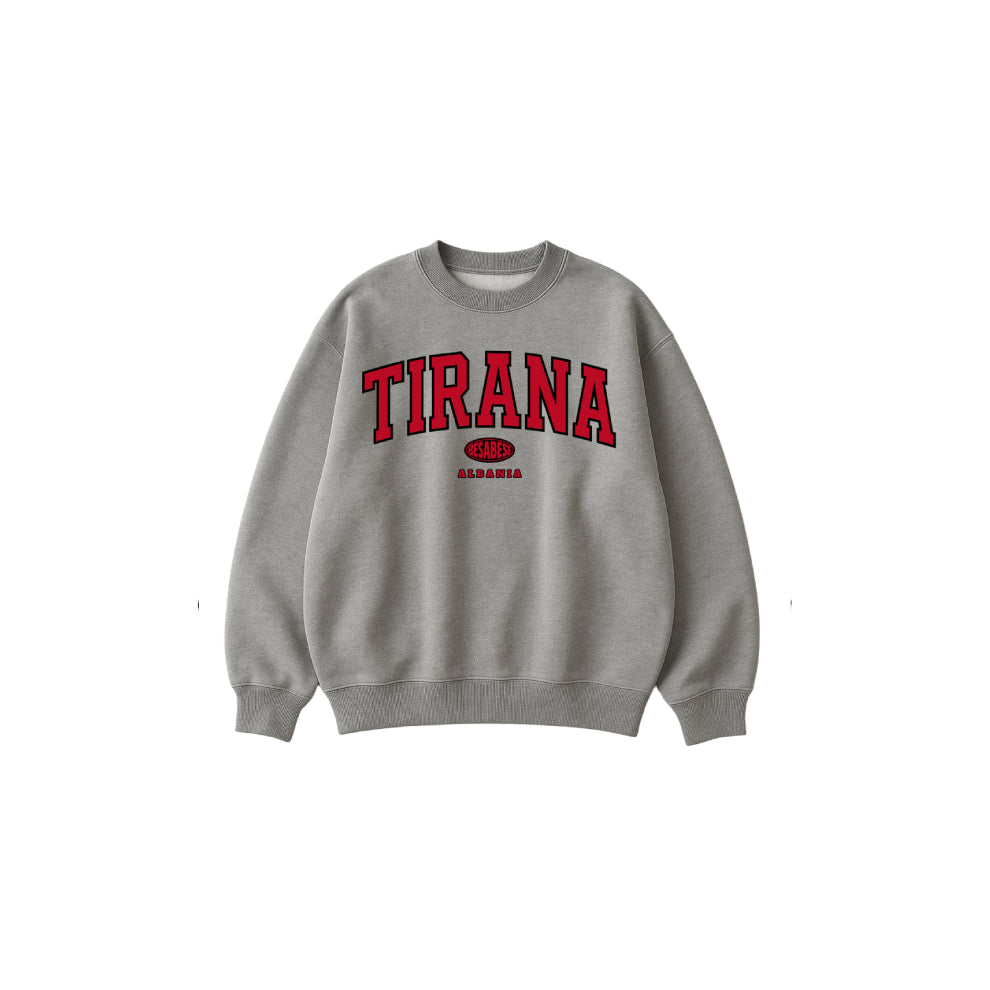 Gray sweatshirt with 'TIRANA' printed in red on a white background