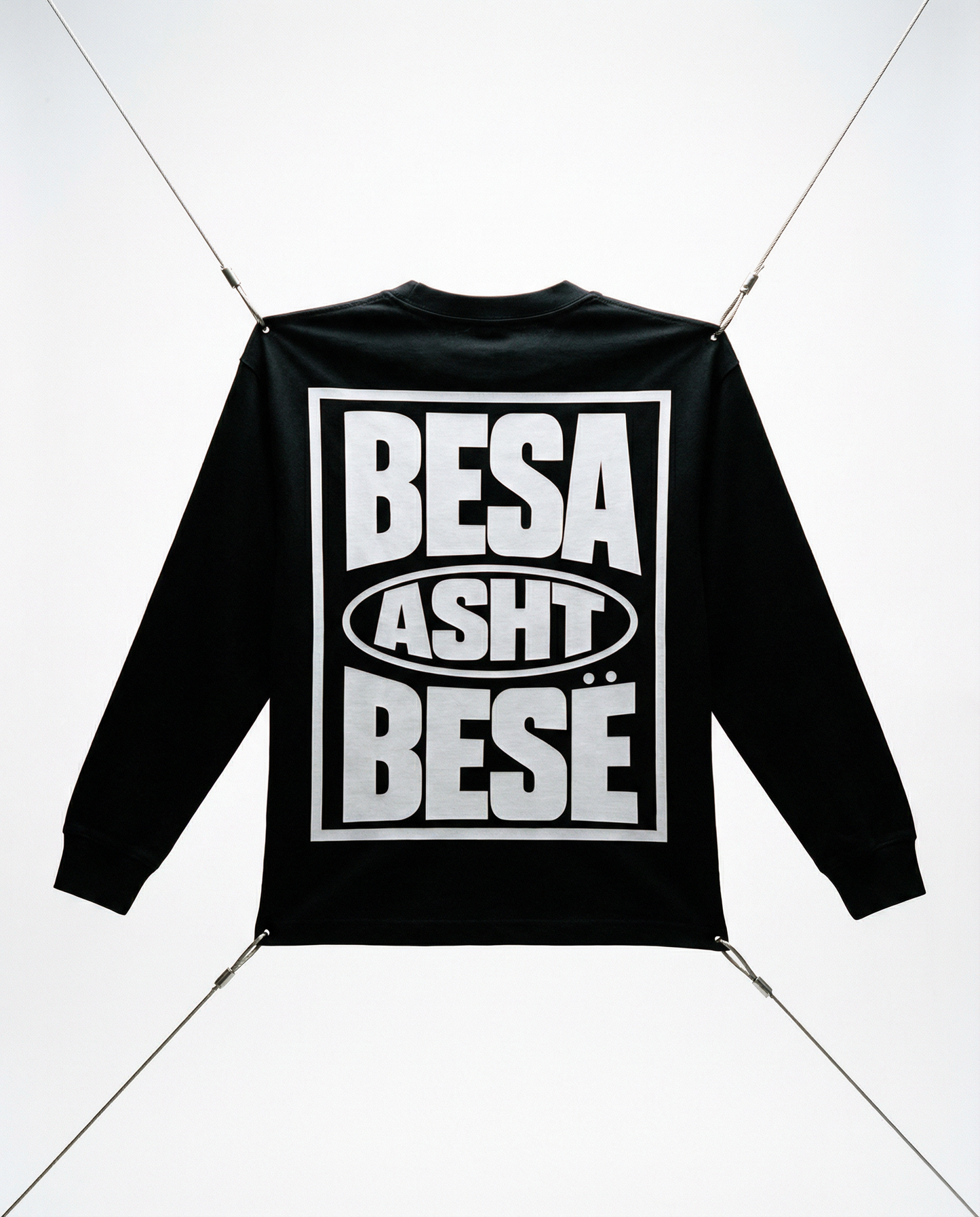 Black jacket with white text on a white background