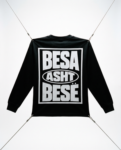 Black jacket with white text on a white background