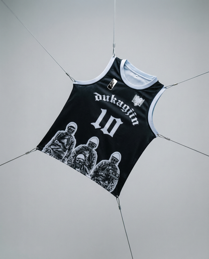 Black tank top with white graphics and text on a gray background