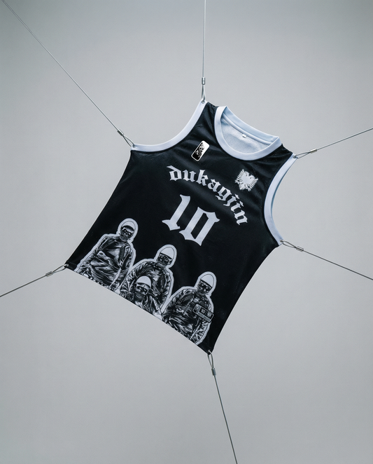 Black tank top with white graphics and text on a gray background