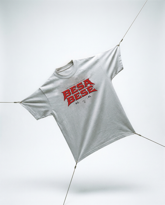 Gray t-shirt with red text 'BESA BESA' on a white background