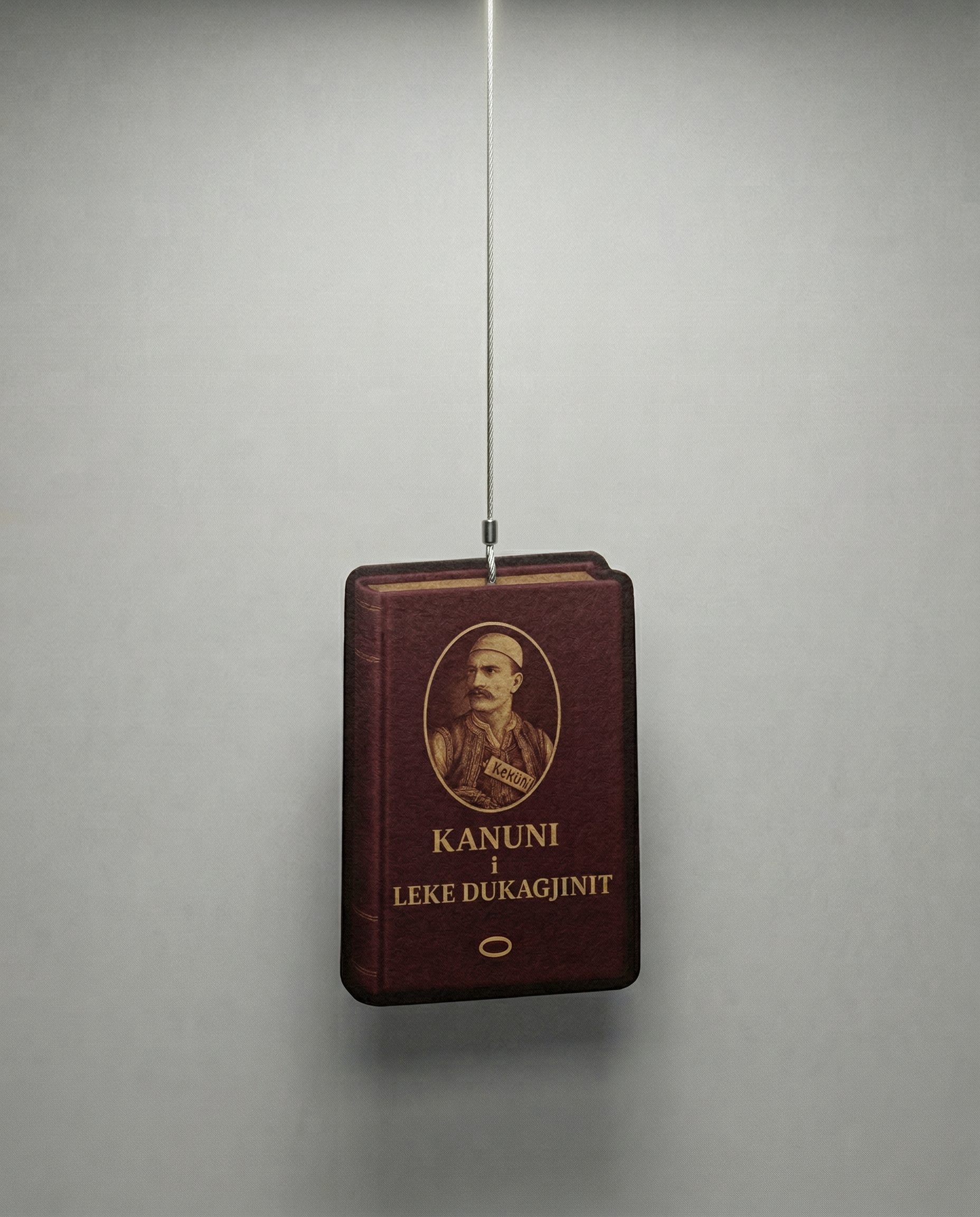 Vintage book with a portrait on the cover, hanging against a plain background