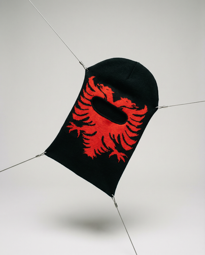 Black balaclava with red eagle design on a white background