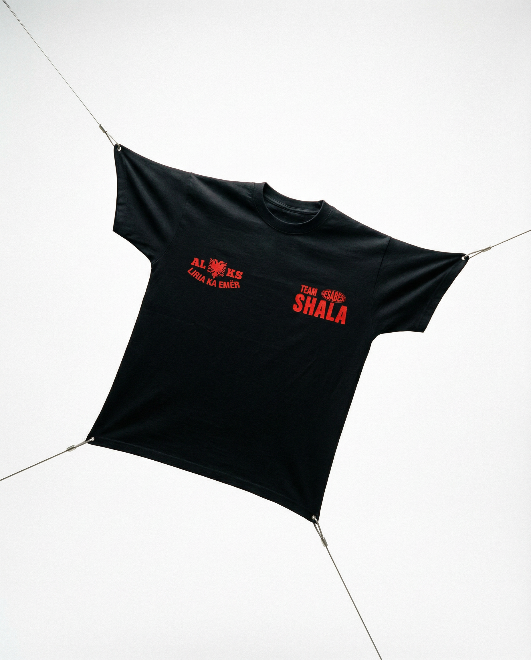 Black tarp with red text on a white background