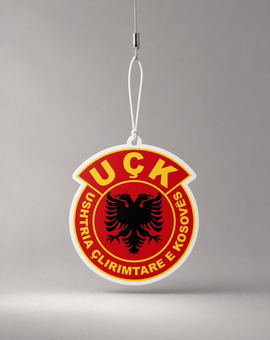 Uşk logo on a red background with a gray background